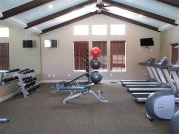 24-Hour sophisticated fitness center with free weights